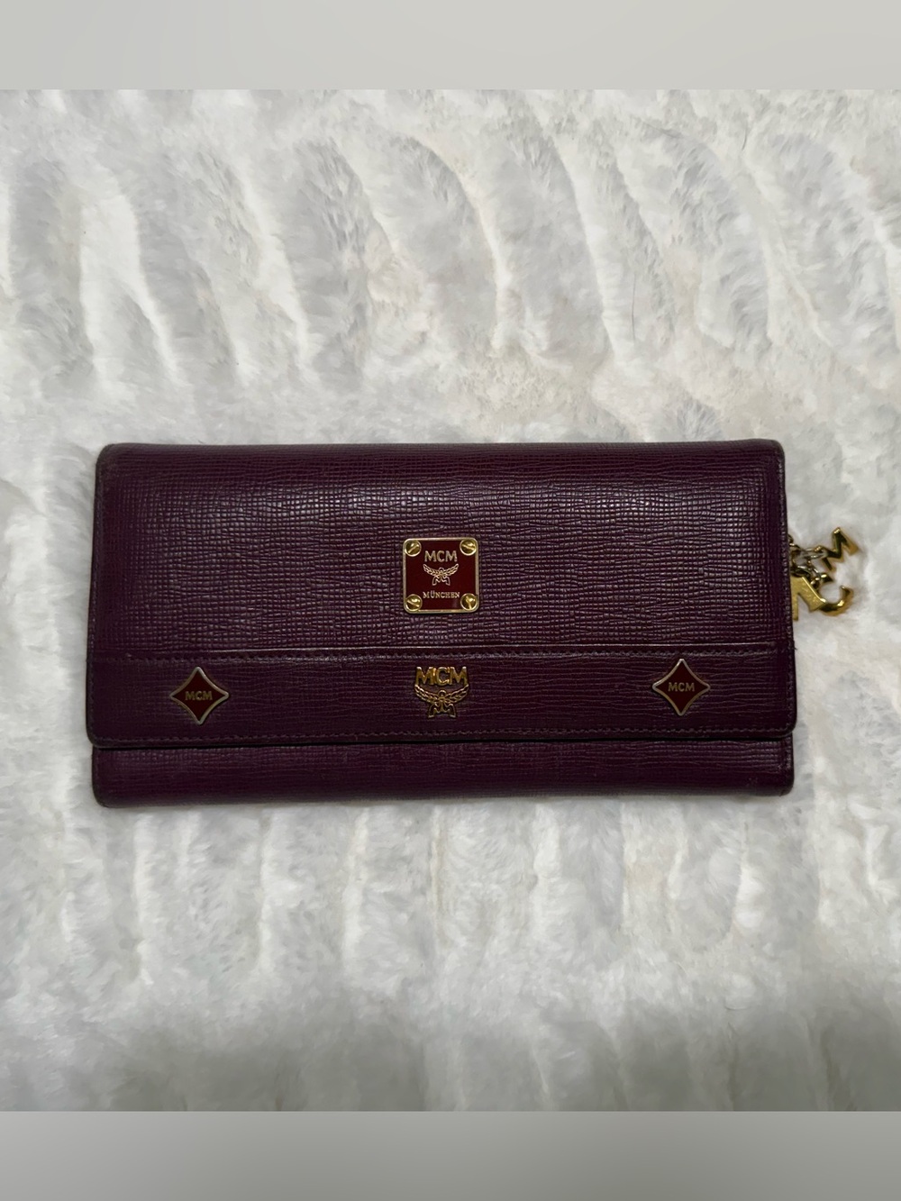 MCM Plum Saffiano Leather Wallet with Gold Emblems